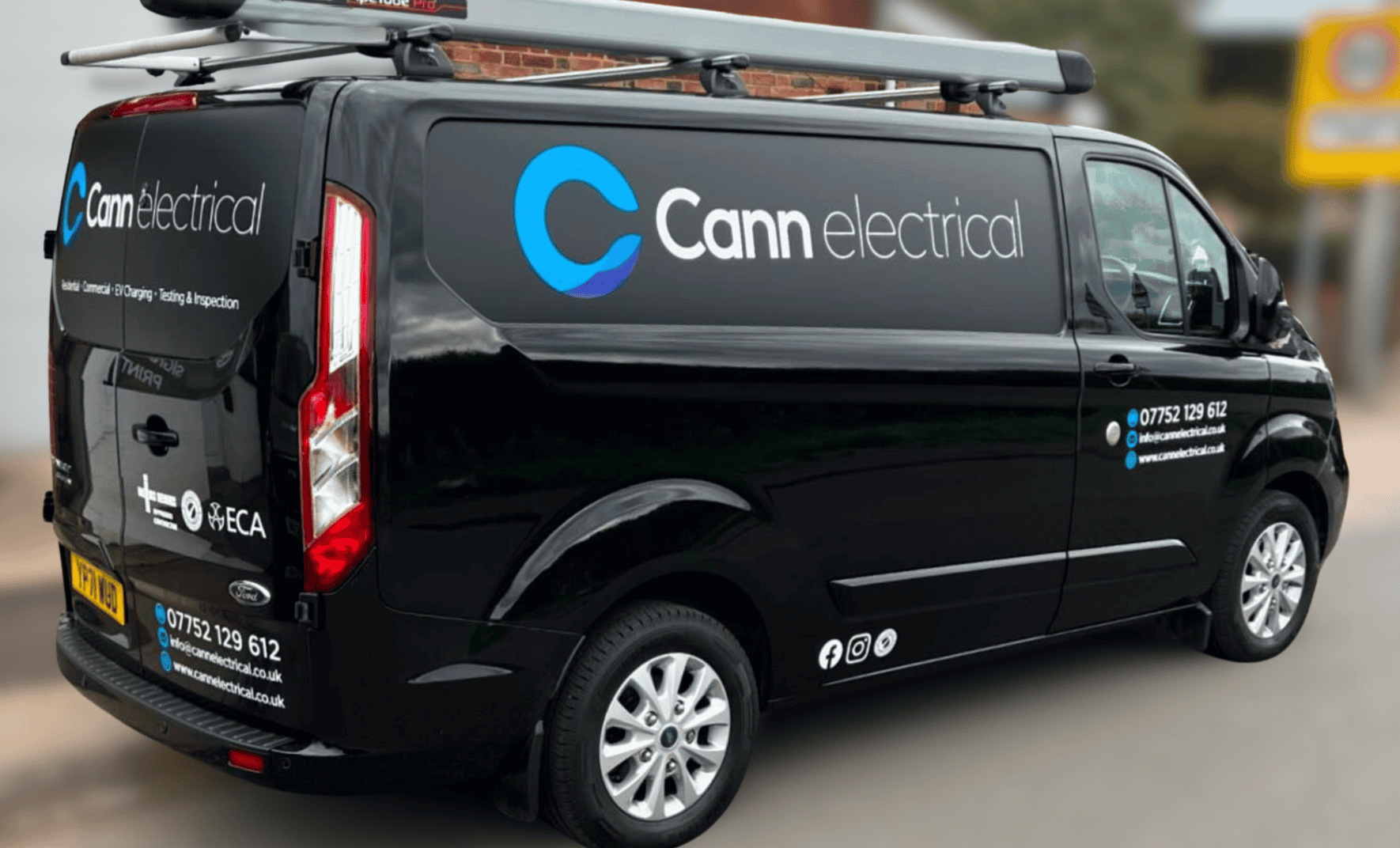 Commercial electrical services van with company branding.